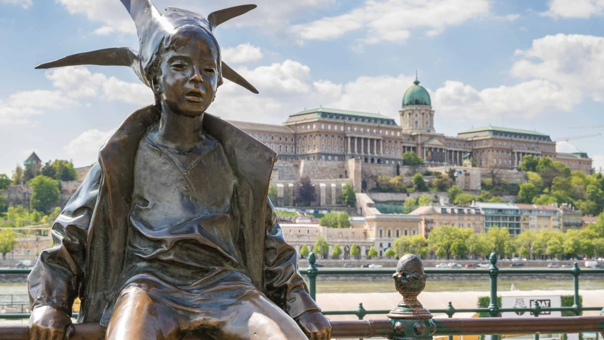 The statue of the Little Princess on Danube Promenade in Budapest